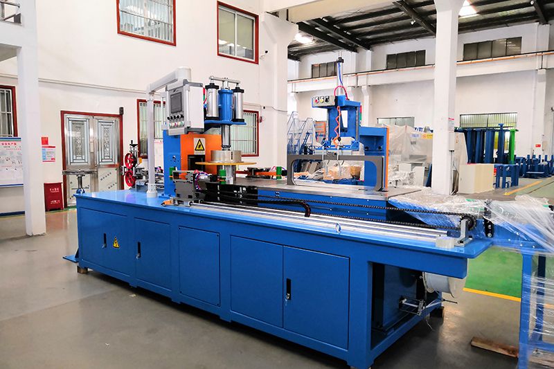 Automatic Cable Coil Strapping and Shrink Wrapping Machine